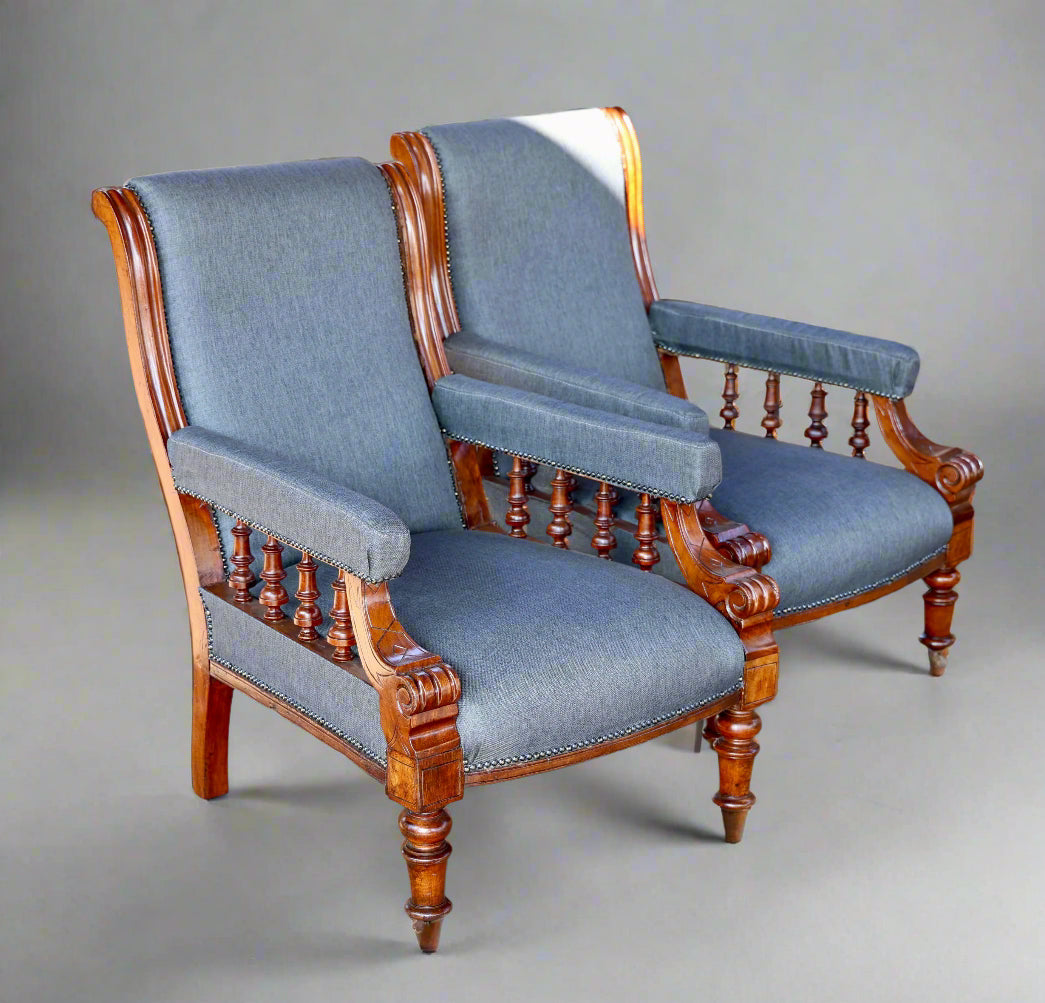 A fine pair of Victorian walnut Open Armchairs