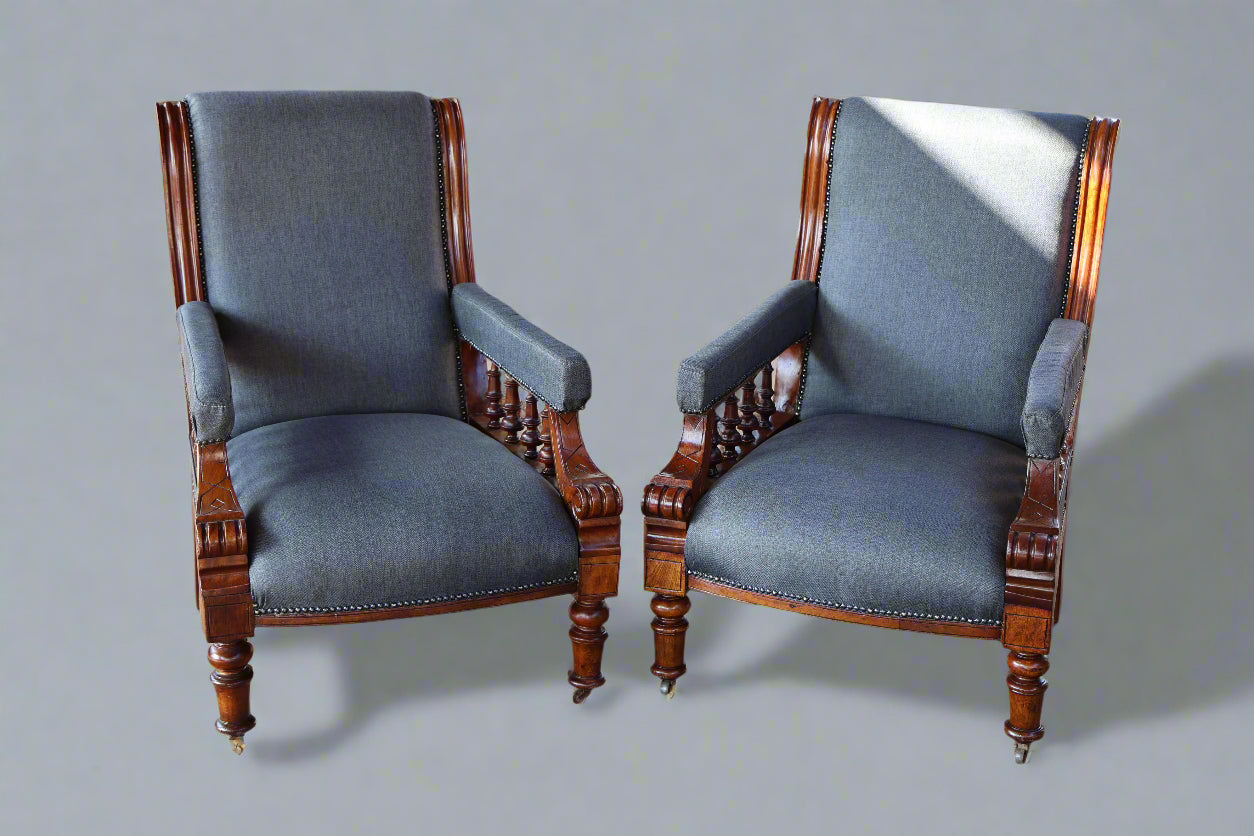A fine pair of Victorian walnut Open Armchairs