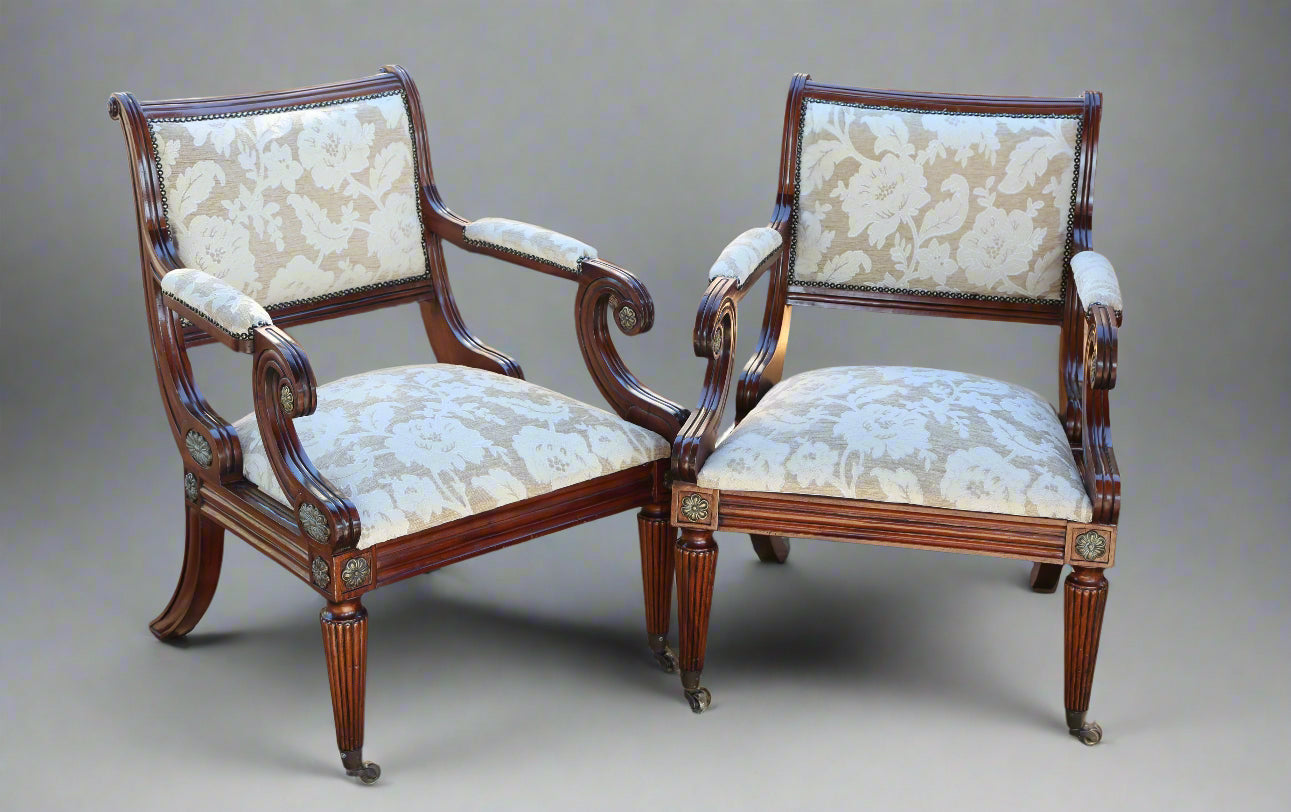 Pair of Empire style mahogany and gilt metal mounted Armchairs