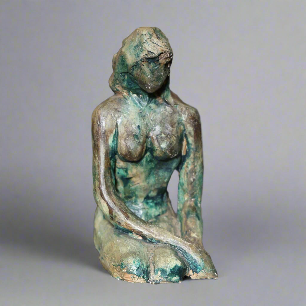 Ceramic sculpture of a kneeling Lady