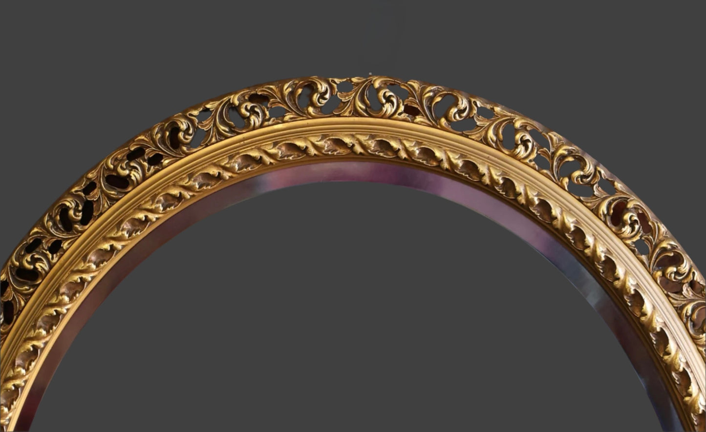 Oval Gilt framed Bevelled Mirror