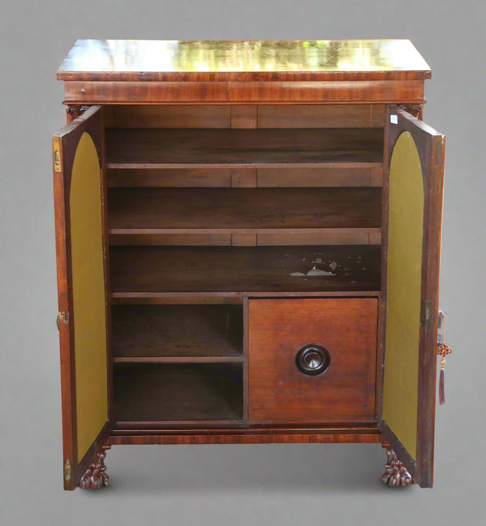 A Regency mahogany Side Cabinet. H104 W87 D46.