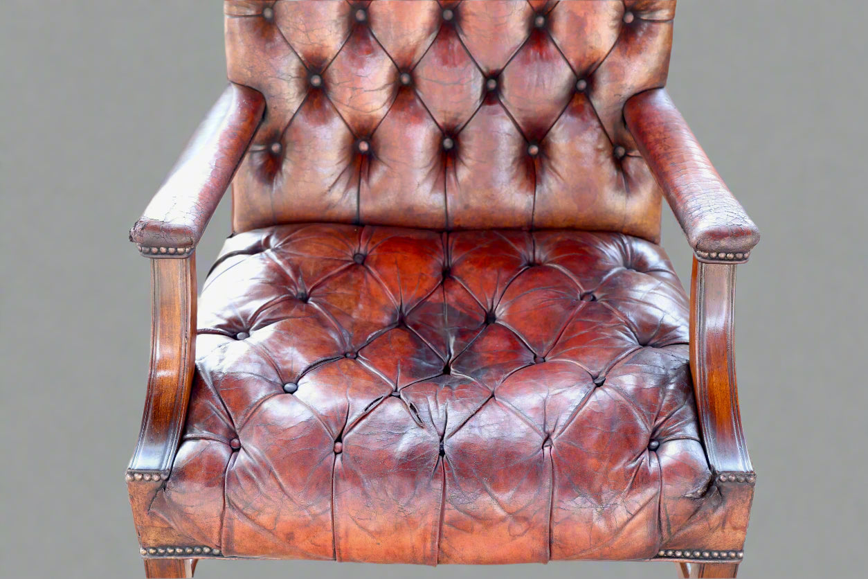 Pair of Georgian mahogany Gainsborough Chairs, upholstered in tufted leather - SOLD