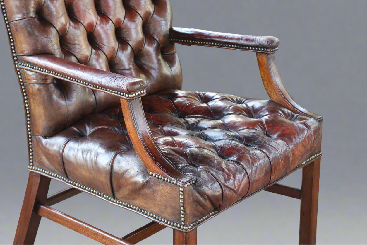 Pair of Georgian mahogany Gainsborough Chairs, upholstered in tufted leather - SOLD