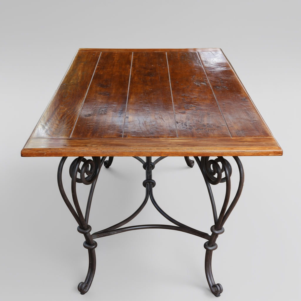 Dining Table with worked metal base.