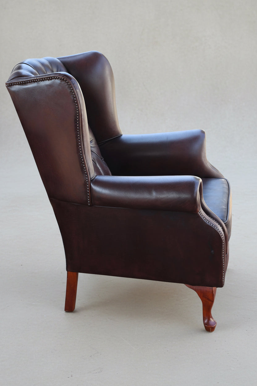 Pair of brown leather chesterfield Wingback Armchairs