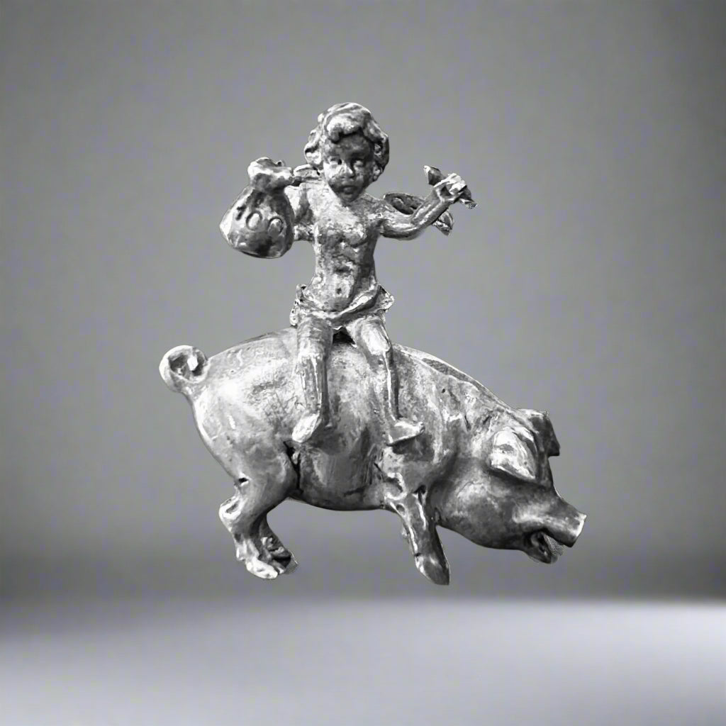 A Miniature silver Pig with a Fairy Rider