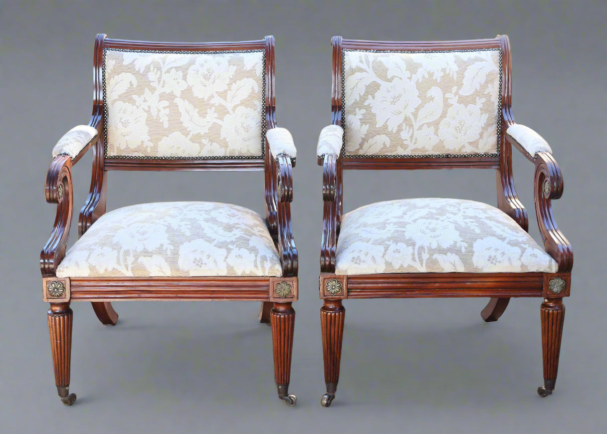 Pair of Empire style mahogany and gilt metal mounted Armchairs