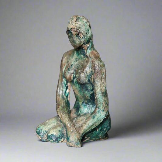 Ceramic sculpture of a kneeling Lady
