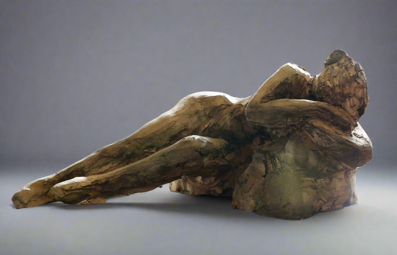 Ceramic sculpture of a recumbent Lady