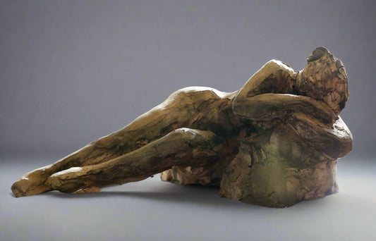 Ceramic sculpture of a recumbent Lady