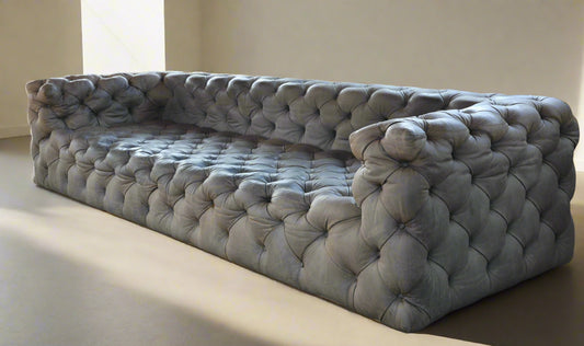 Weylandts four seater Cuban Tufted leather Sofa