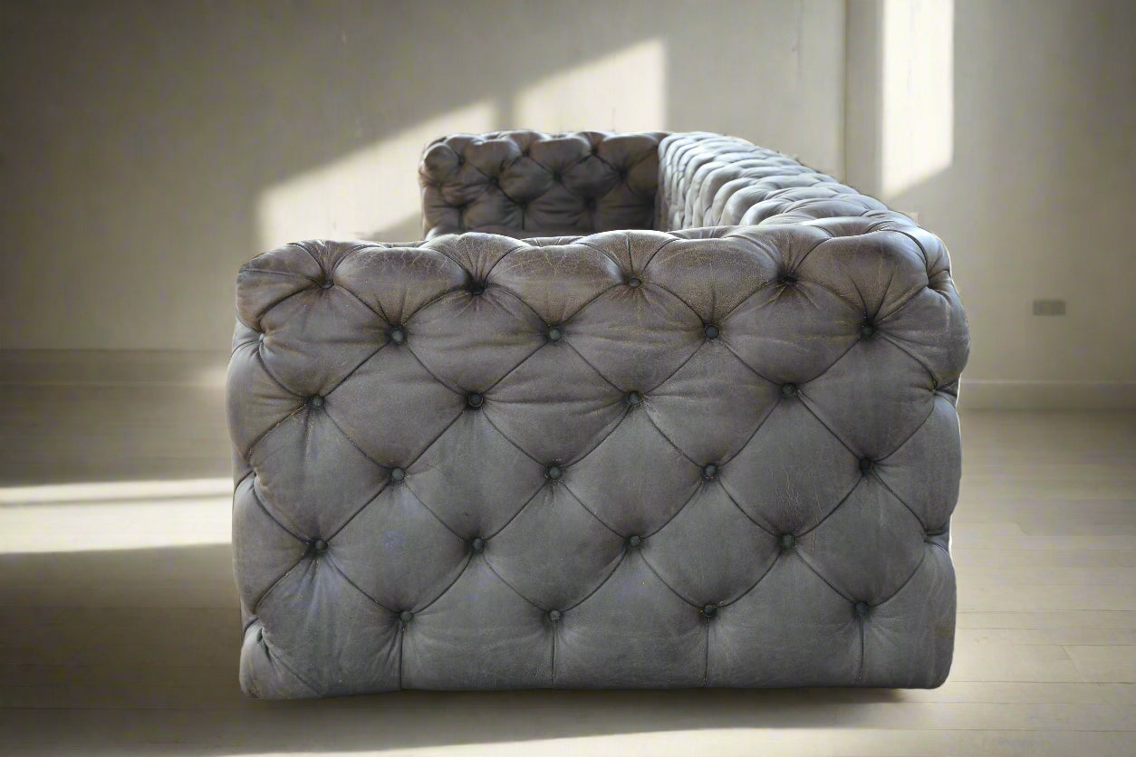 Weylandts four seater Cuban Tufted leather Sofa