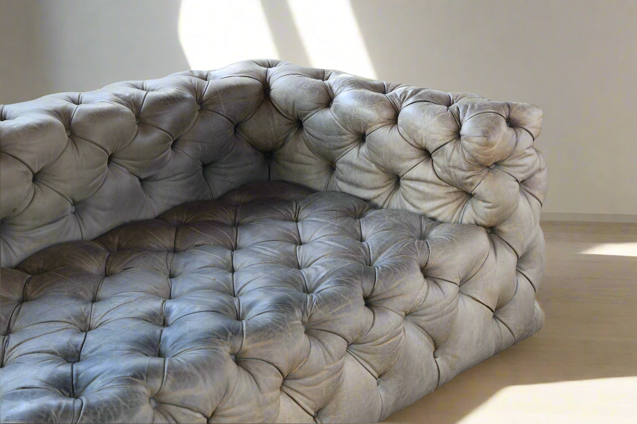 Weylandts four seater Cuban Tufted leather Sofa