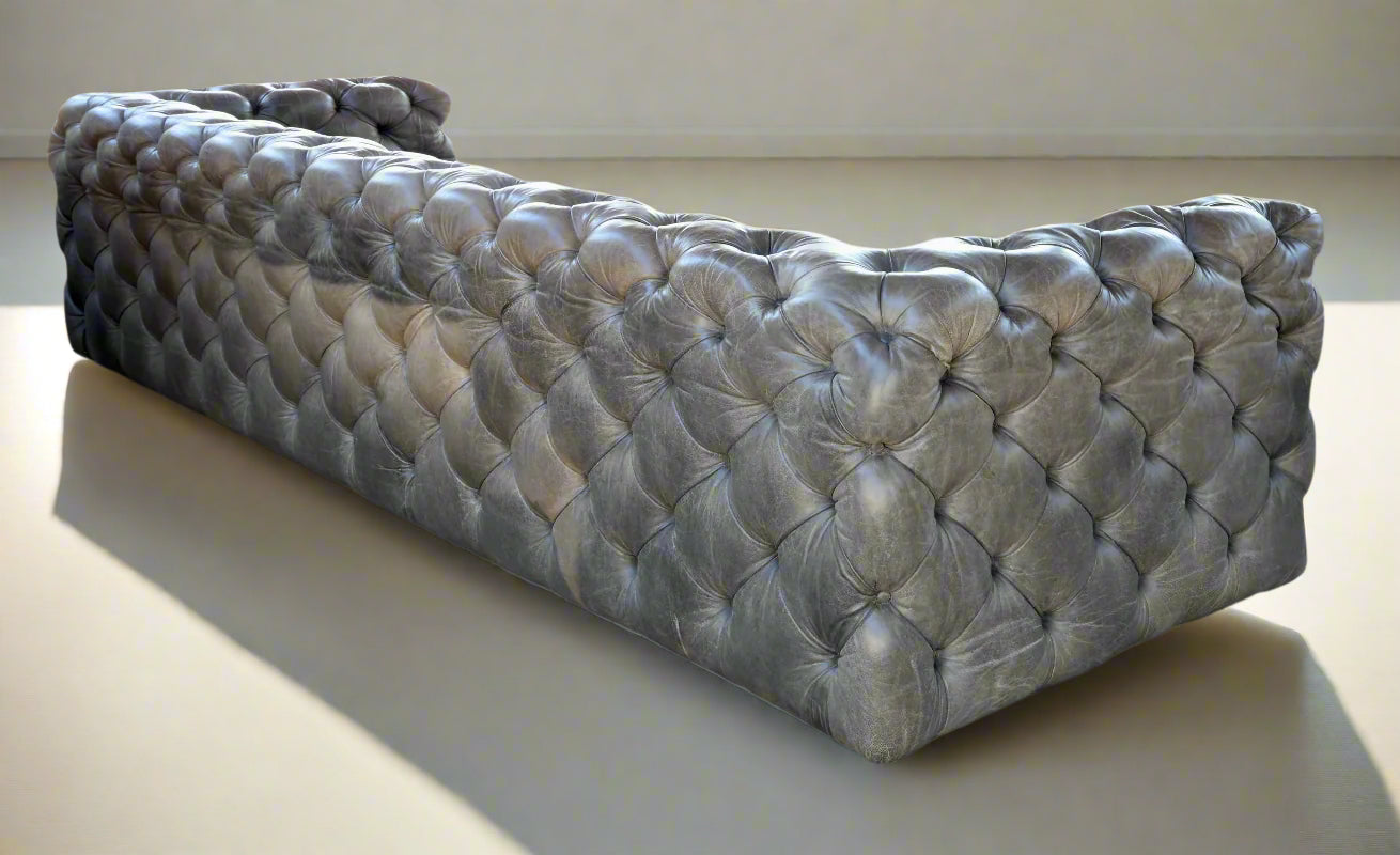 Weylandts four seater Cuban Tufted leather Sofa