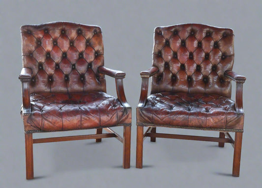 Pair of Georgian mahogany Gainsborough Chairs, upholstered in tufted leather - SOLD