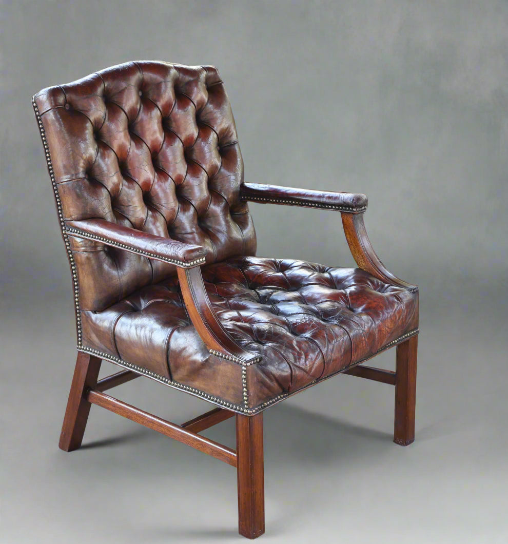 Pair of Georgian mahogany Gainsborough Chairs, upholstered in tufted leather - SOLD