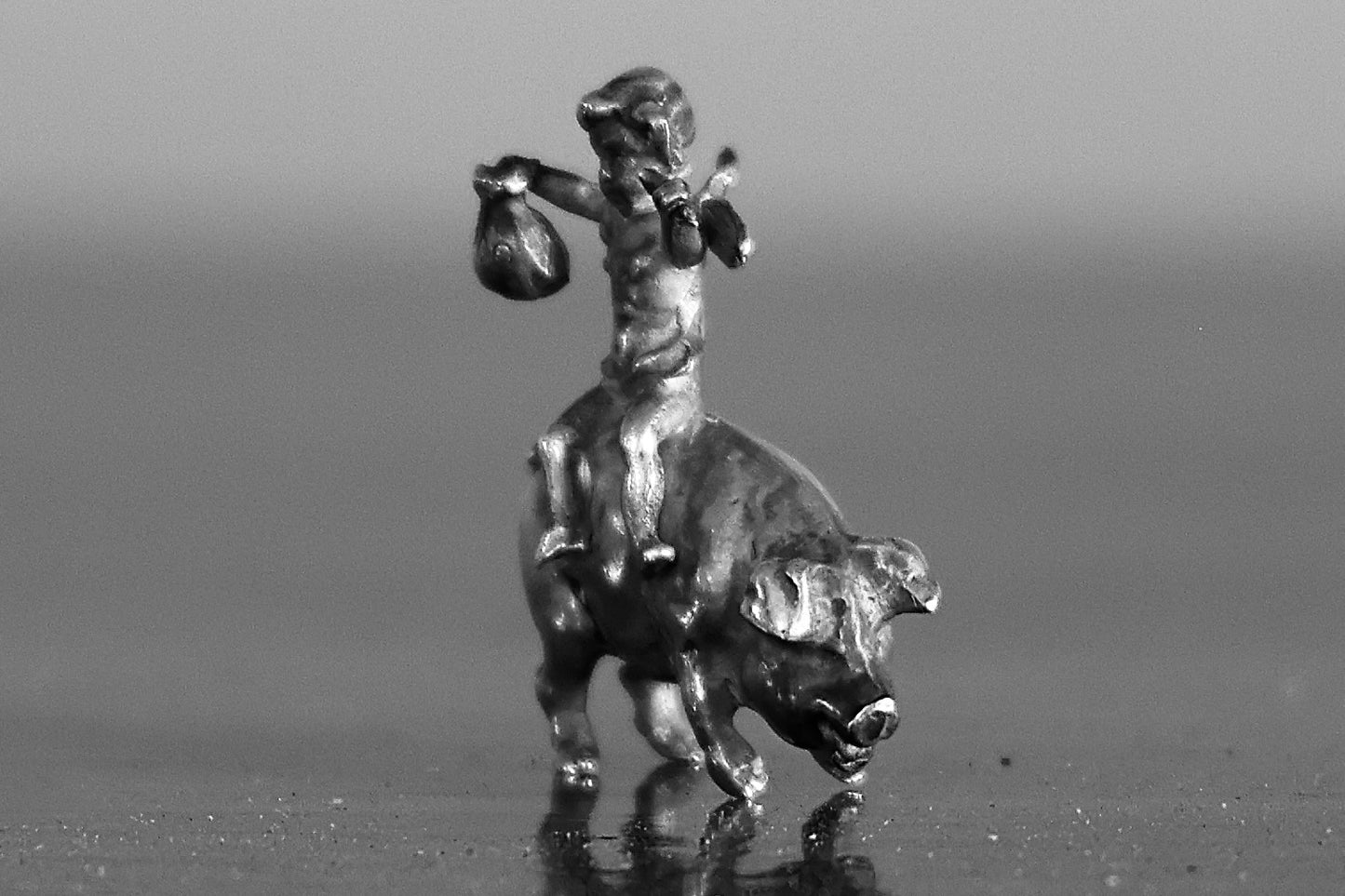 A Miniature silver Pig with a Fairy Rider