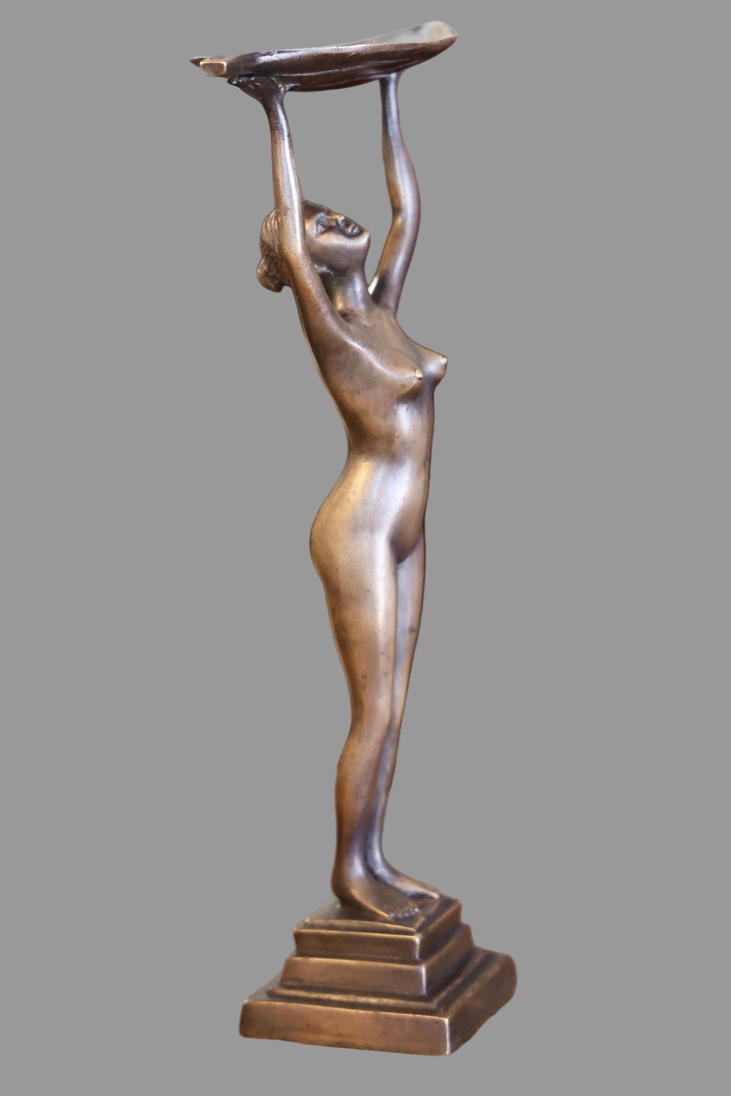 Bronze Figurine of a Lady holding a leaf