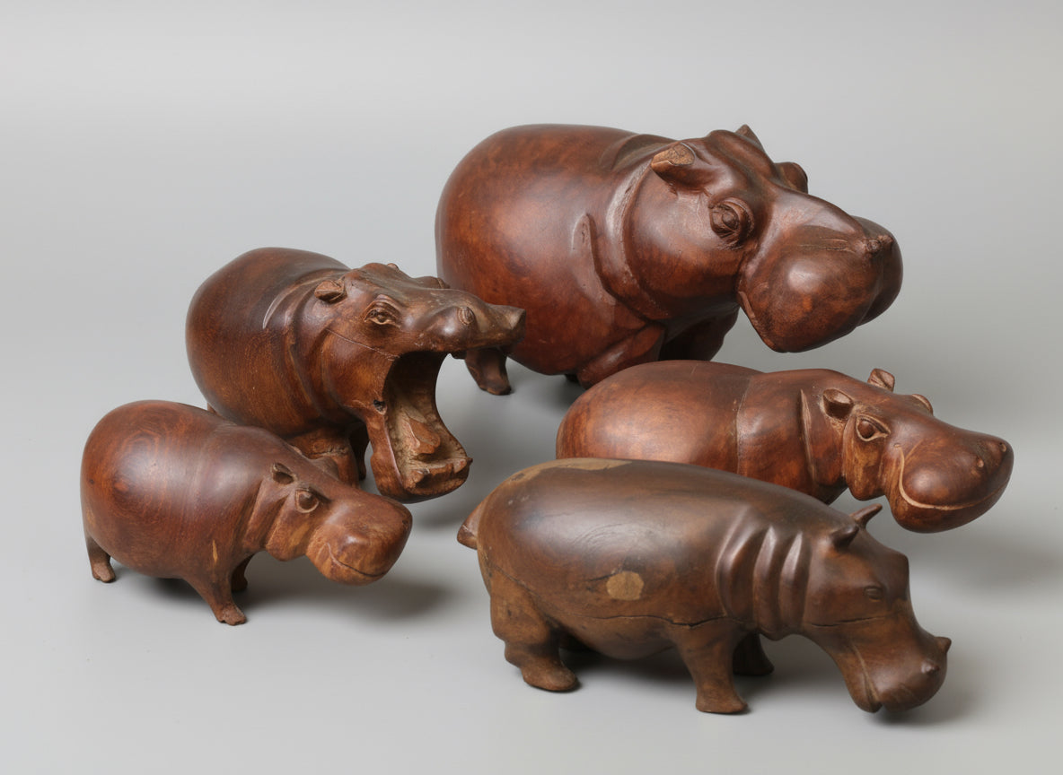 A family of  five carved wooden Hippo's - SOLD QUICKLY