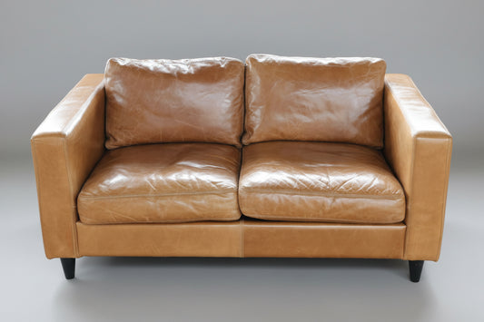 Pair of tan Leather Sofas, with beautiful patina