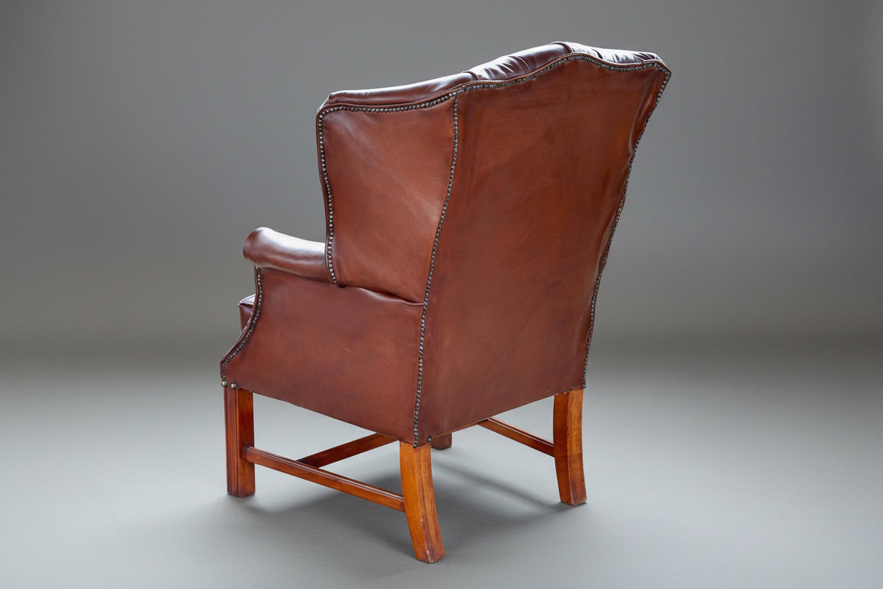 Fine Pair of Georgian Style Buttoned Leather Wingback Chairs