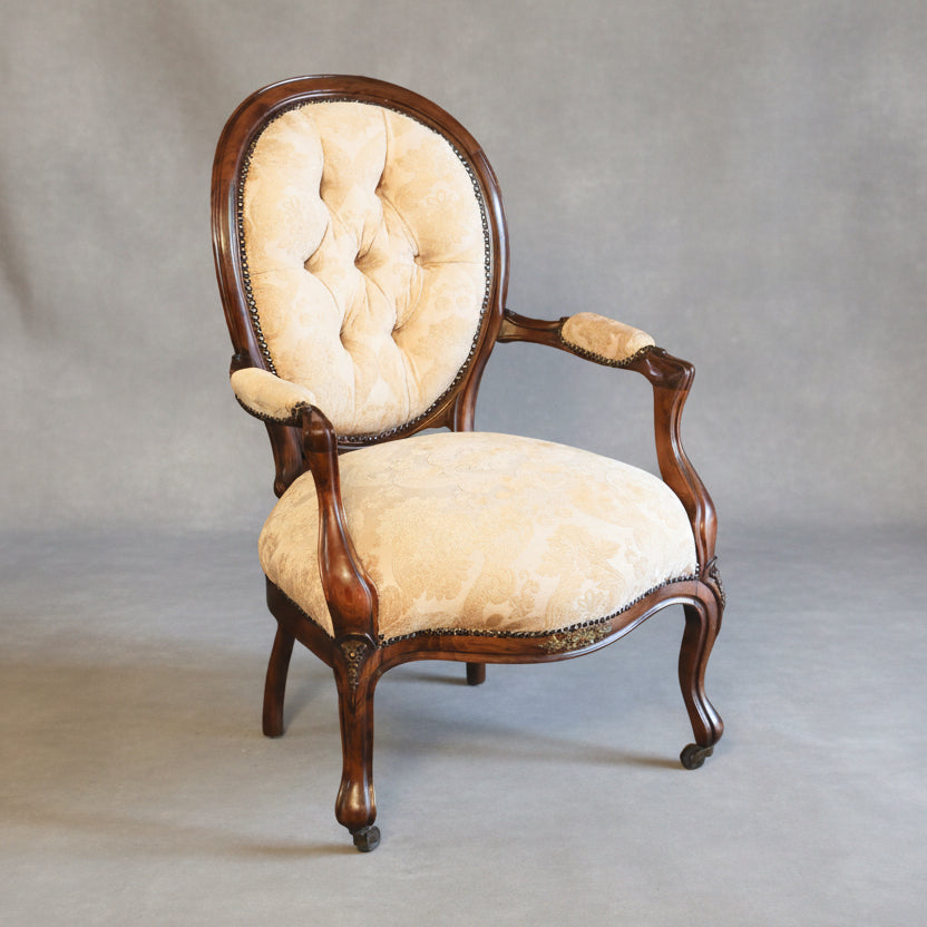 Victorian mahogany Open Armchair, on original castors