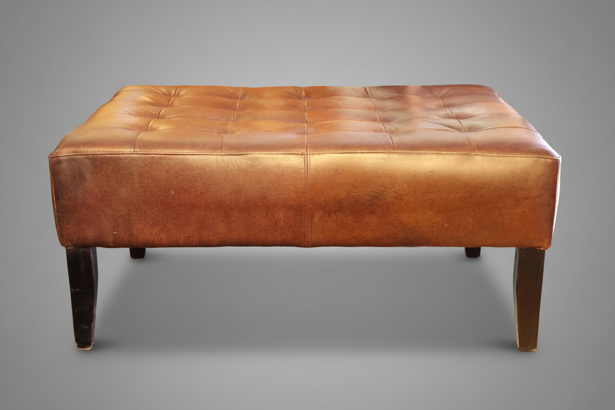 Stunning leather Ottoman, with beautiful patina.