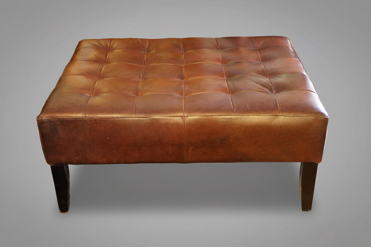 Stunning leather Ottoman, with beautiful patina.