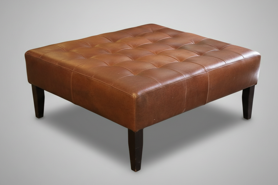 Stunning leather Ottoman, with beautiful patina.