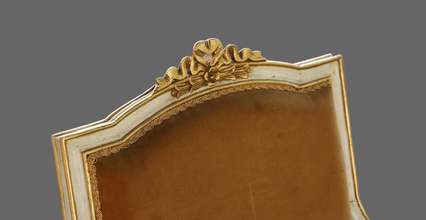 Two Pairs of Neoclassical or Louis XVI style painted and parcel-gilt Open Armchairs