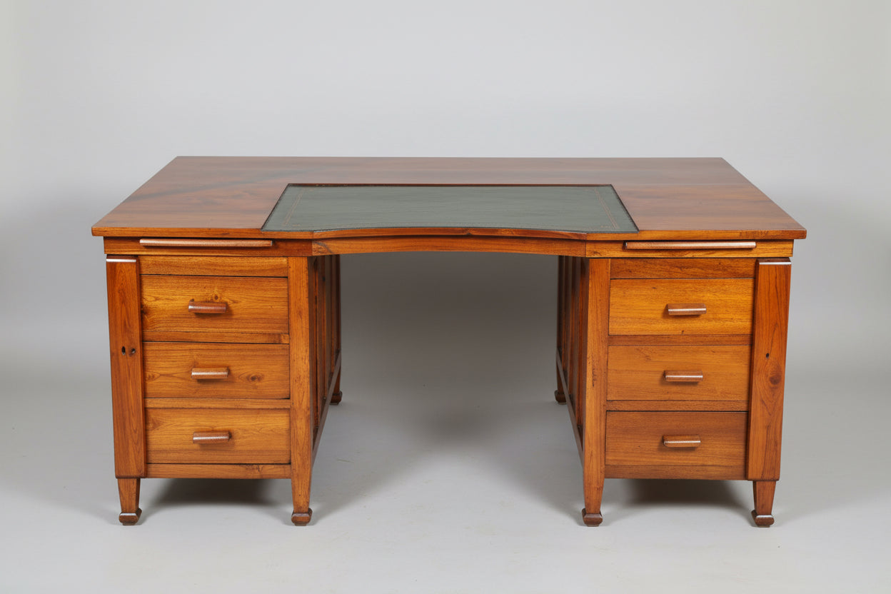 Large teak Partners Desk, with tooled leather section. Early 20th Century
