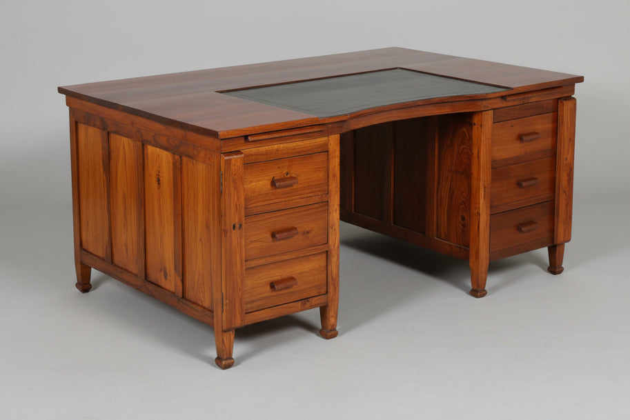 Large teak Partners Desk, with tooled leather section. Early 20th Century