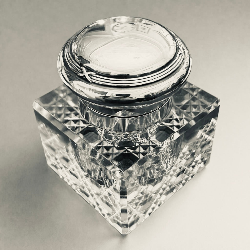 An Edwardian silver topped Inkwell.
