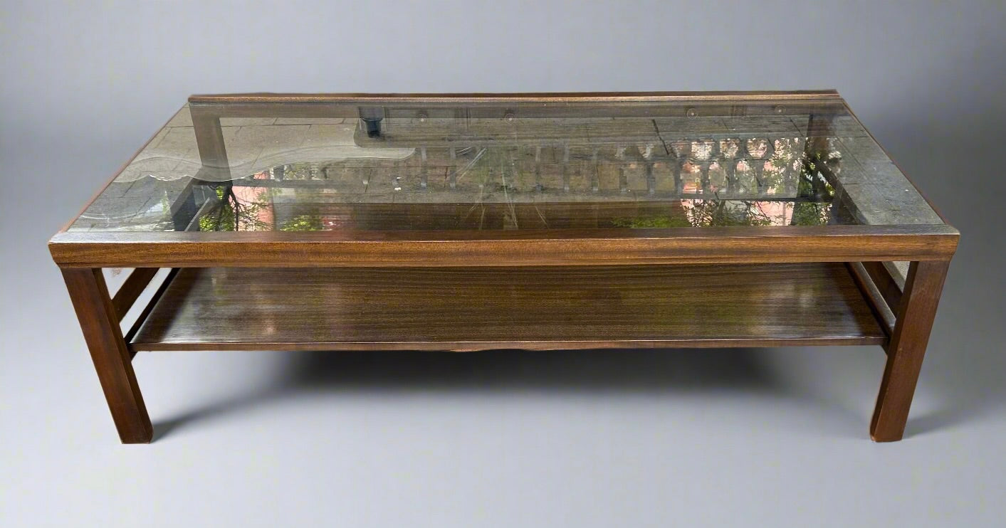 Mid-Century two-tiered coffee table with a glass top