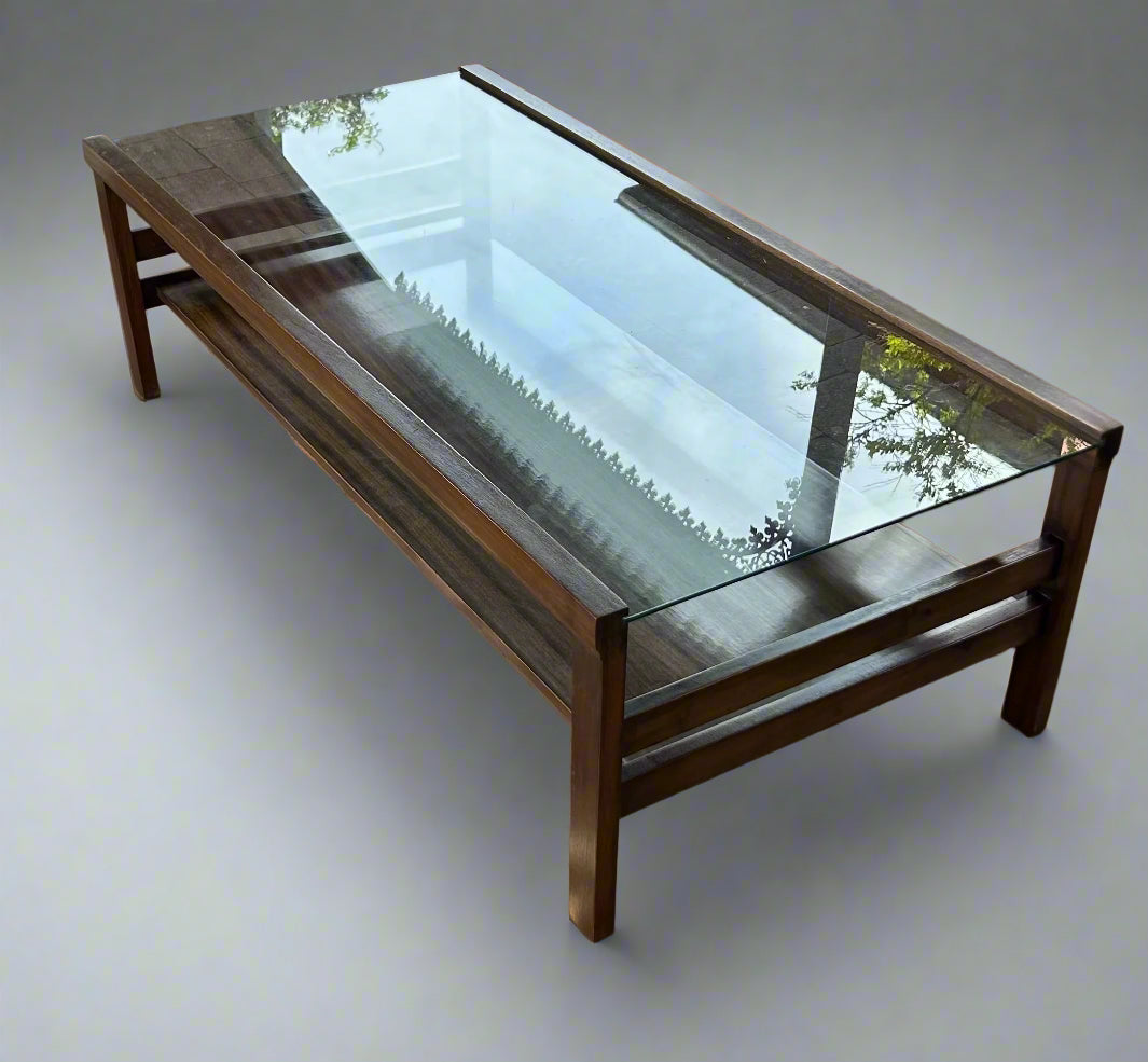 Mid-Century two-tiered coffee table with a glass top