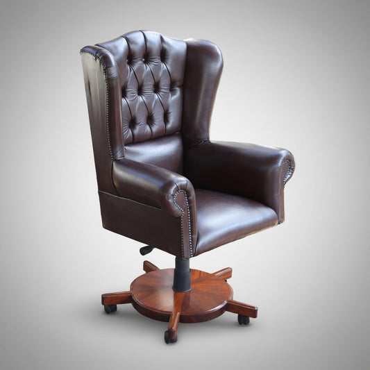 Fine leather chesterfield style Executive Office Chair, on mahogany base