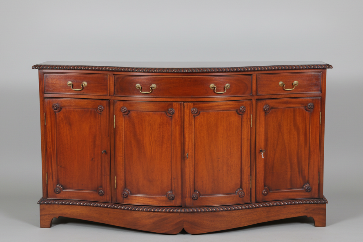 Griffiths & Griffiths mahogany serpentine shaped Sideboard