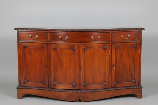 Griffiths & Griffiths mahogany serpentine shaped Sideboard