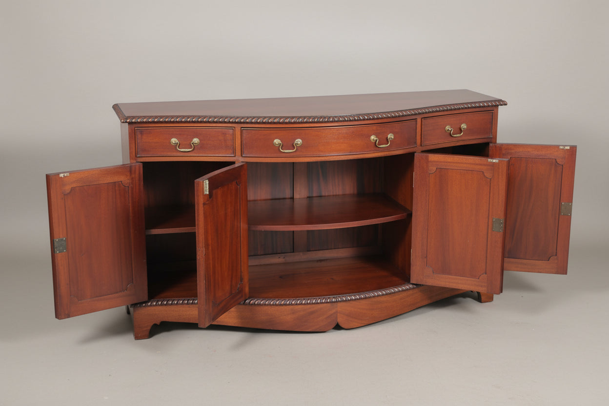 Griffiths & Griffiths mahogany serpentine shaped Sideboard