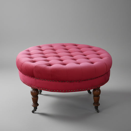 Upholstered Ottoman, on turned legs and castors