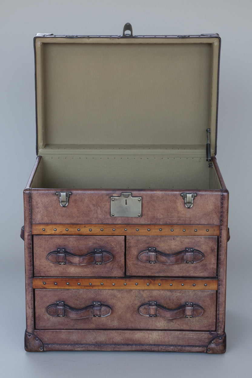 Pair of leather trunk style Pedestals