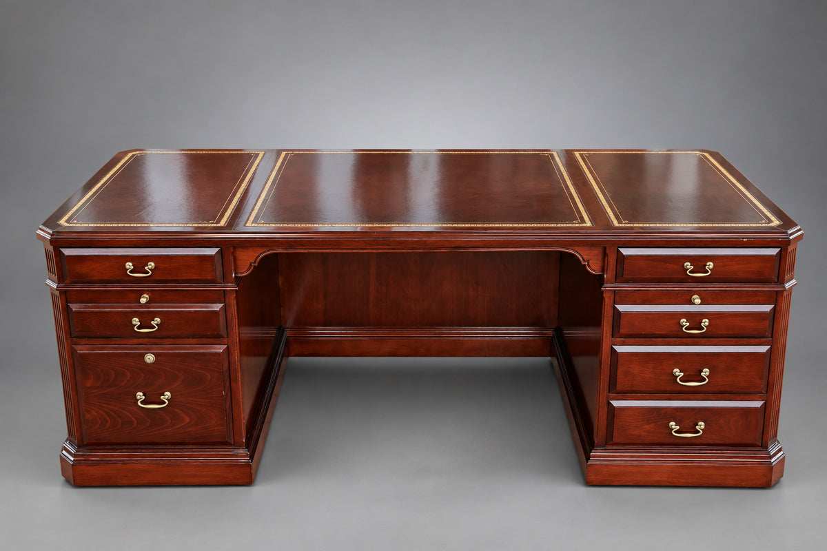 Mahogany leather topped Desk.