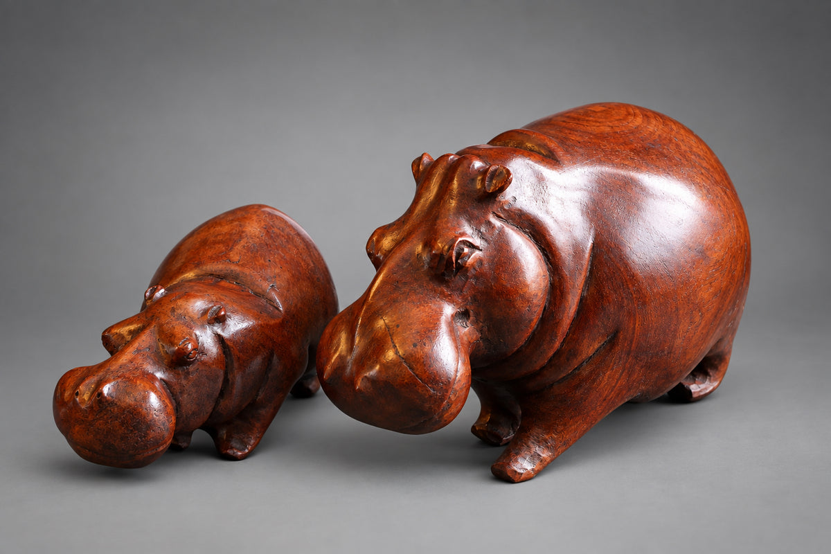 Two hand carved wood Hippos R895 & R1895