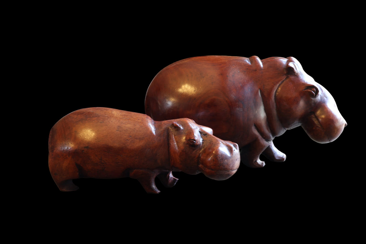 Two hand carved wood Hippos R895 & R1895
