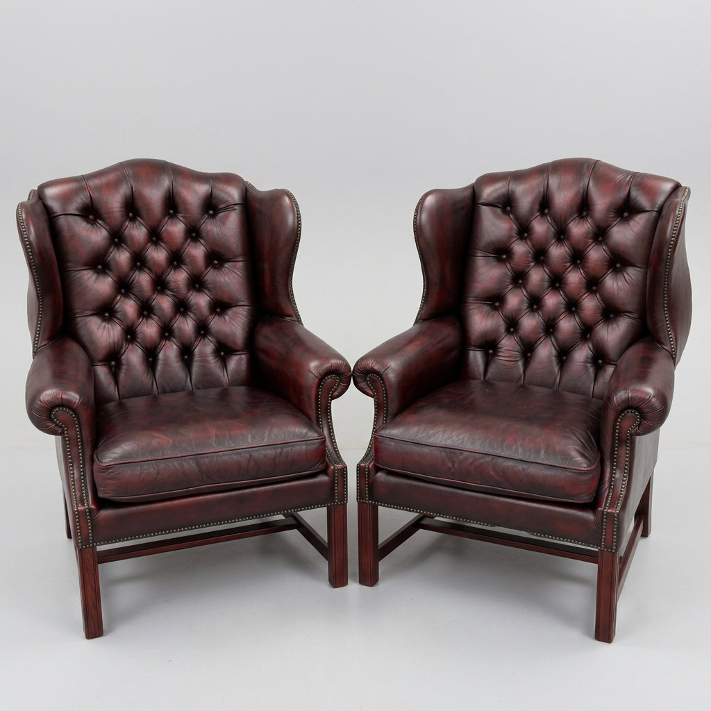 Stunning pair of Griffiths & Griffiths Victorian style ox blood leather Chesterfield Wingback Armchairs - SOLD