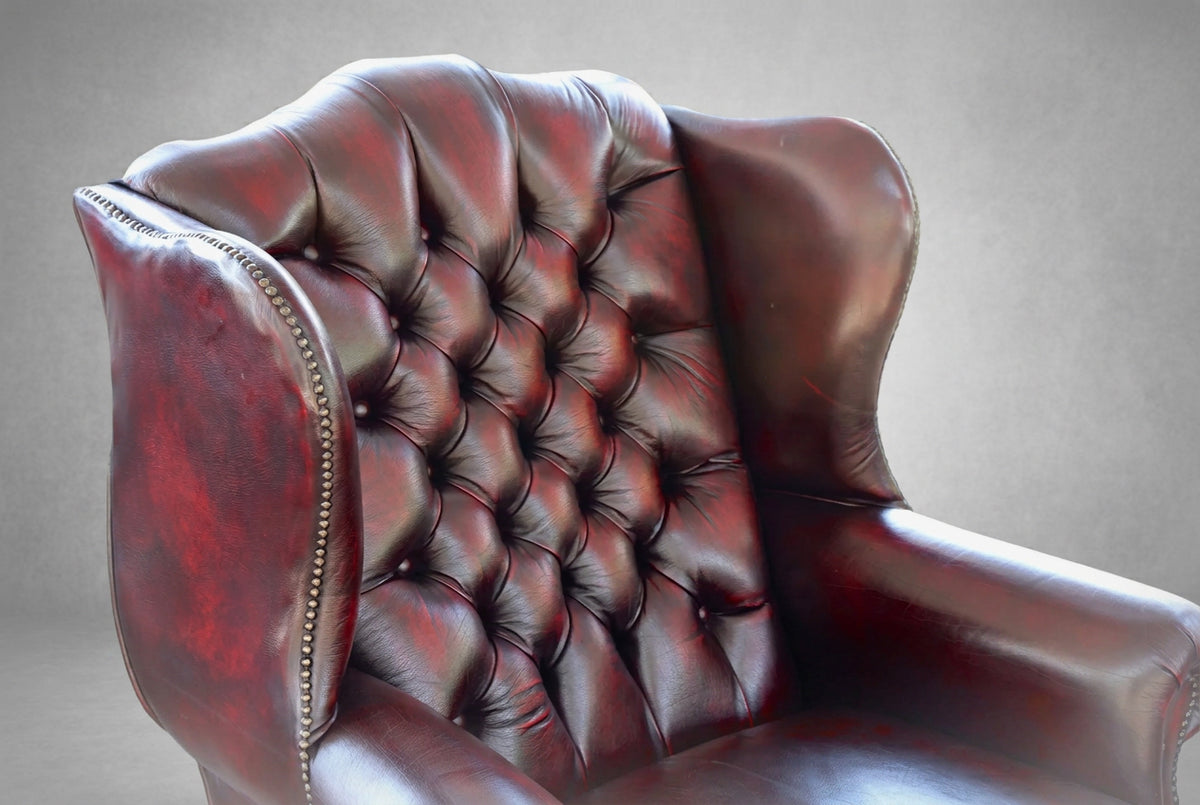 Stunning pair of Griffiths & Griffiths Victorian style ox blood leather Chesterfield Wingback Armchairs - SOLD