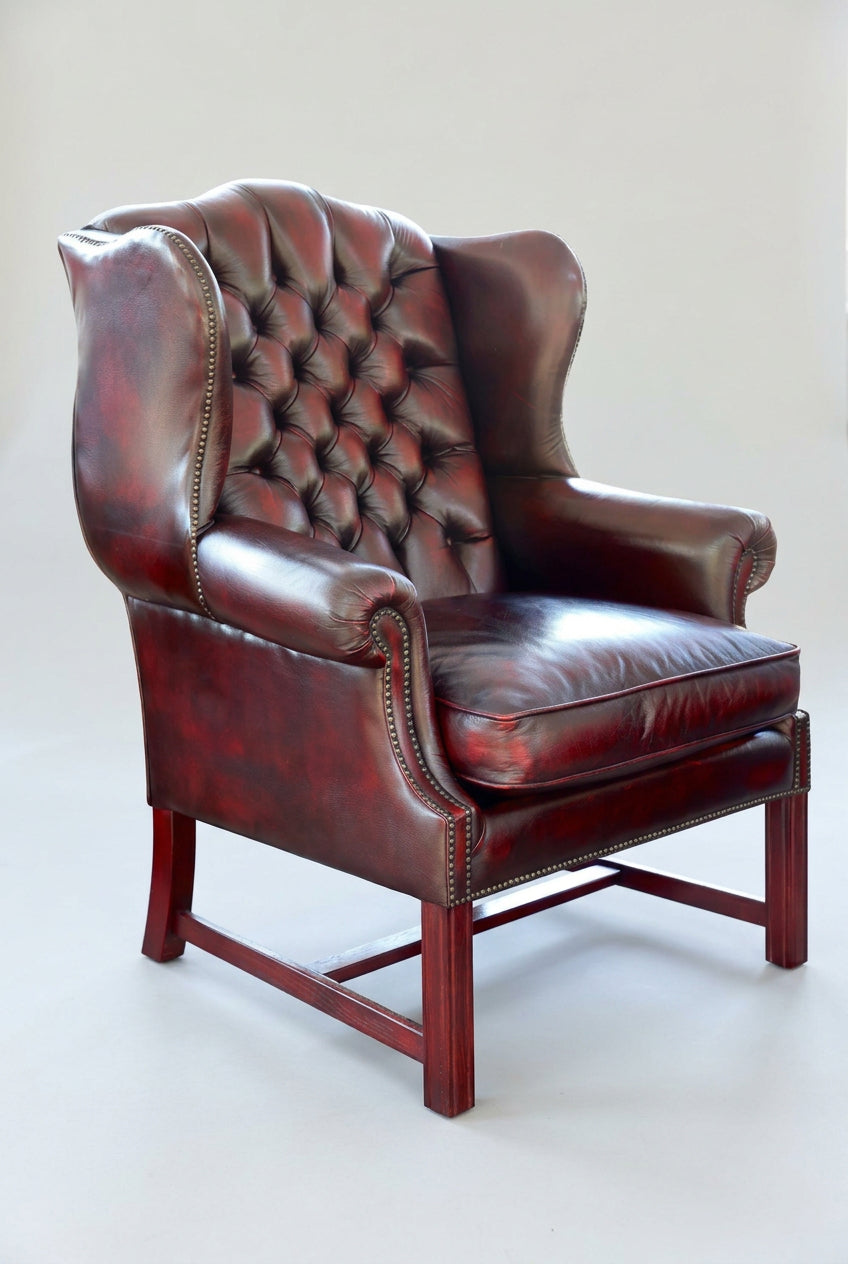 Stunning pair of Griffiths & Griffiths Victorian style ox blood leather Chesterfield Wingback Armchairs - SOLD