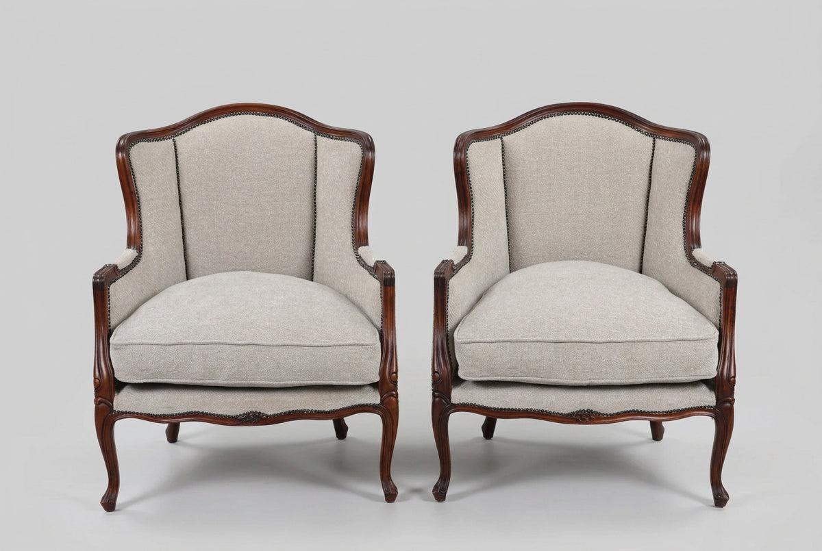 Stunning pair of Griffiths & Griffiths French Louis XV style wingback Bergères