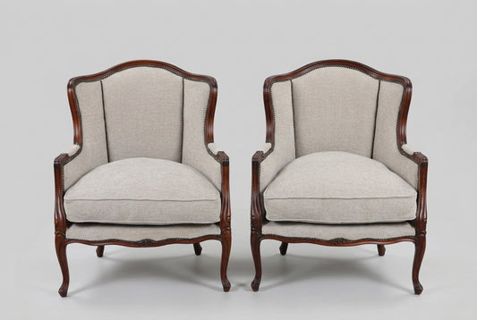 Stunning pair of Griffiths & Griffiths French Louis XV style wingback Bergères